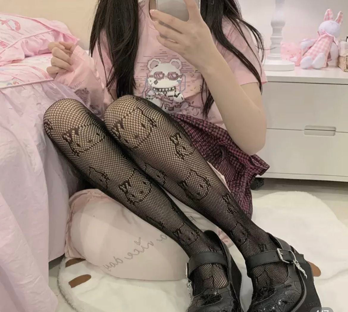 Hello Kitty Fishnet Stockings Size: one size fits - Depop