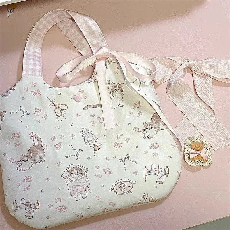 Cat and ribbons Hand Bag